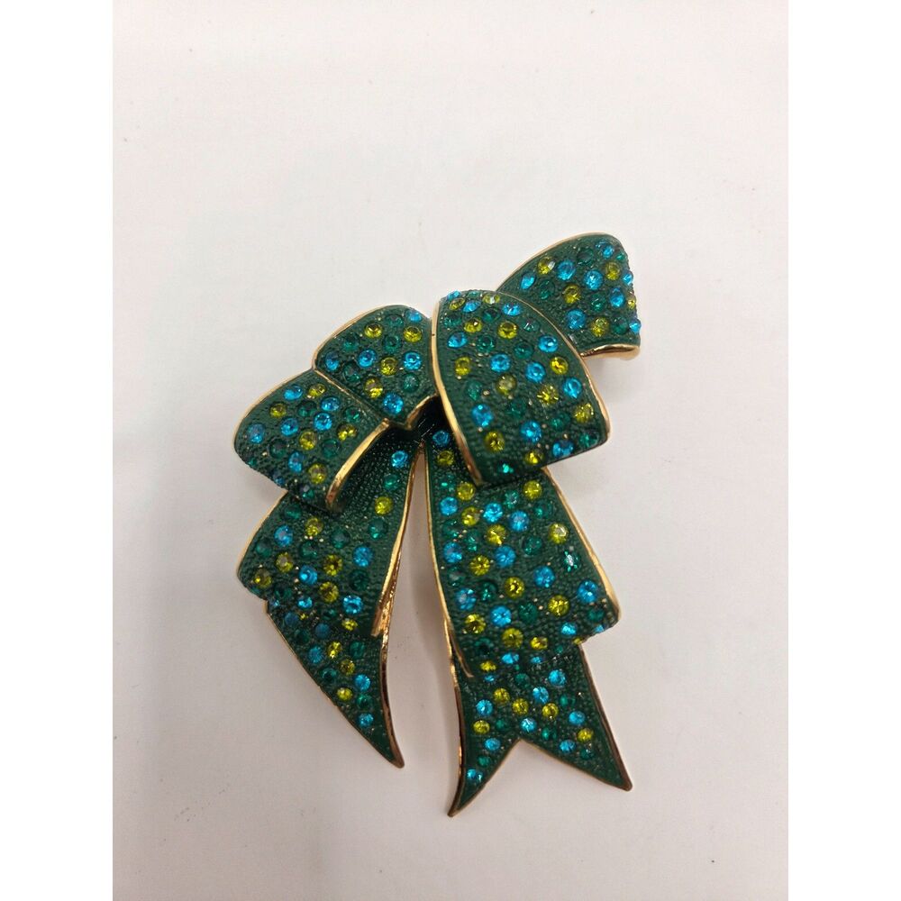 1764. Vintage Joan Rivers Green Flowing Bow Ribbon Brooch Pin